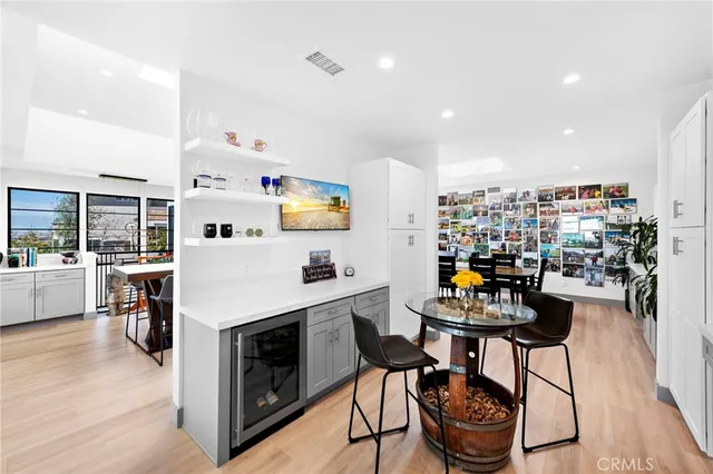a view of a bedroom with furniture and closet