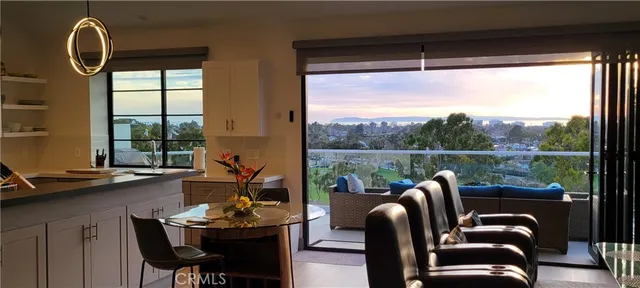 a view of a city with lush green forest
