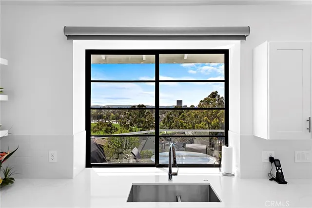 a view of a balcony with couches