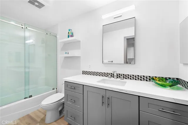 a view of a backyard with a patio