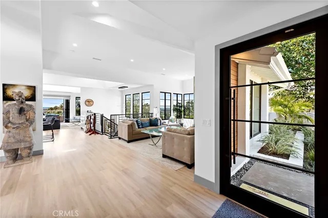 a view of a dining room with furniture and a livingroom
