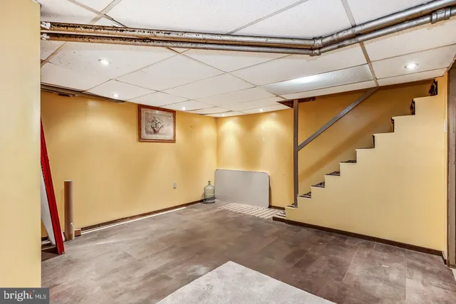 a view of a garage with stairs