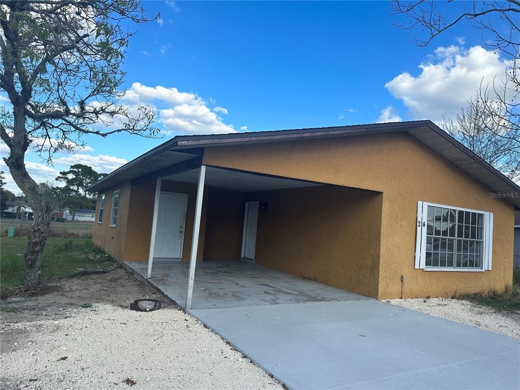 24 Spring Loop Circle Ocala, FL 34472 - Photo 1 of 1 a house with a outdoor space