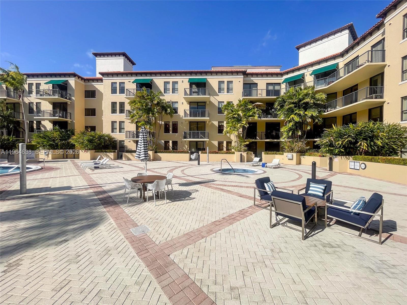 55 Merrick Way, Unit 715 Coral Gables, FL 33134 - Photo 41 of 52 a view of a building with sitting area