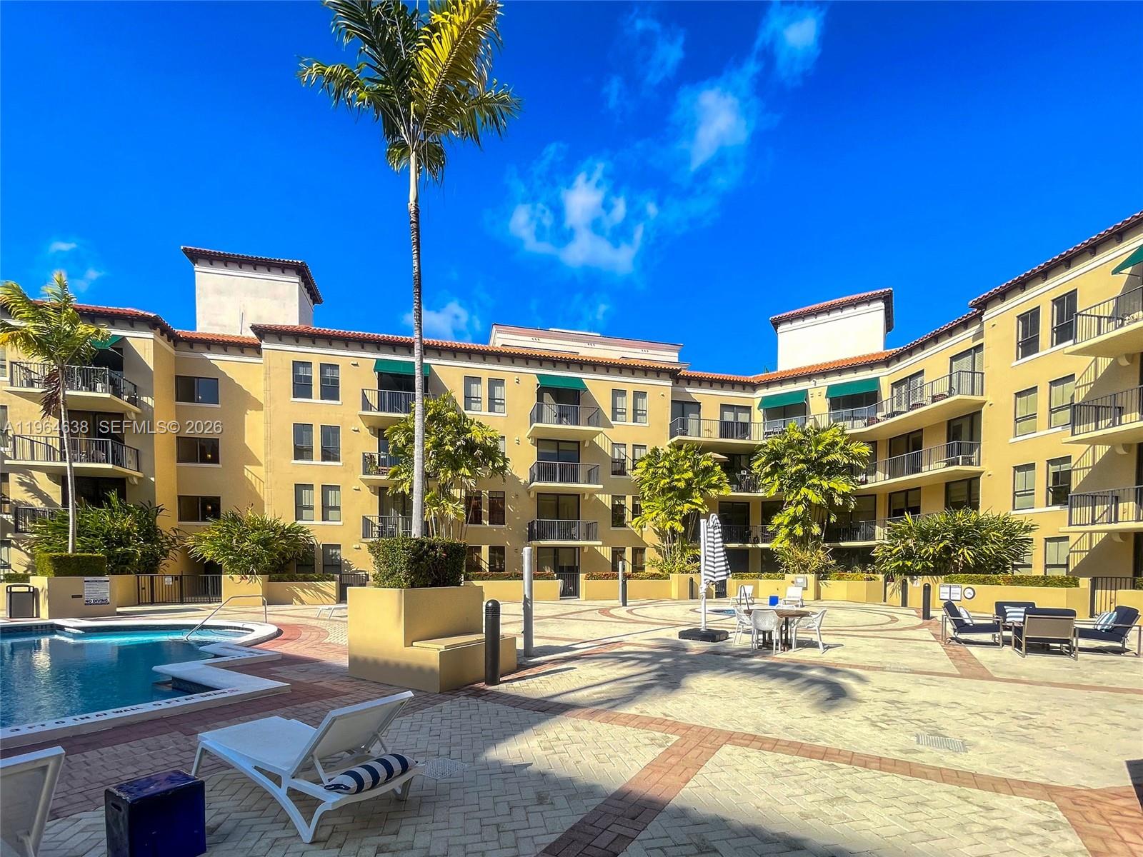 55 Merrick Way, Unit 715 Coral Gables, FL 33134 - Photo 44 of 52 a view of a building with street view