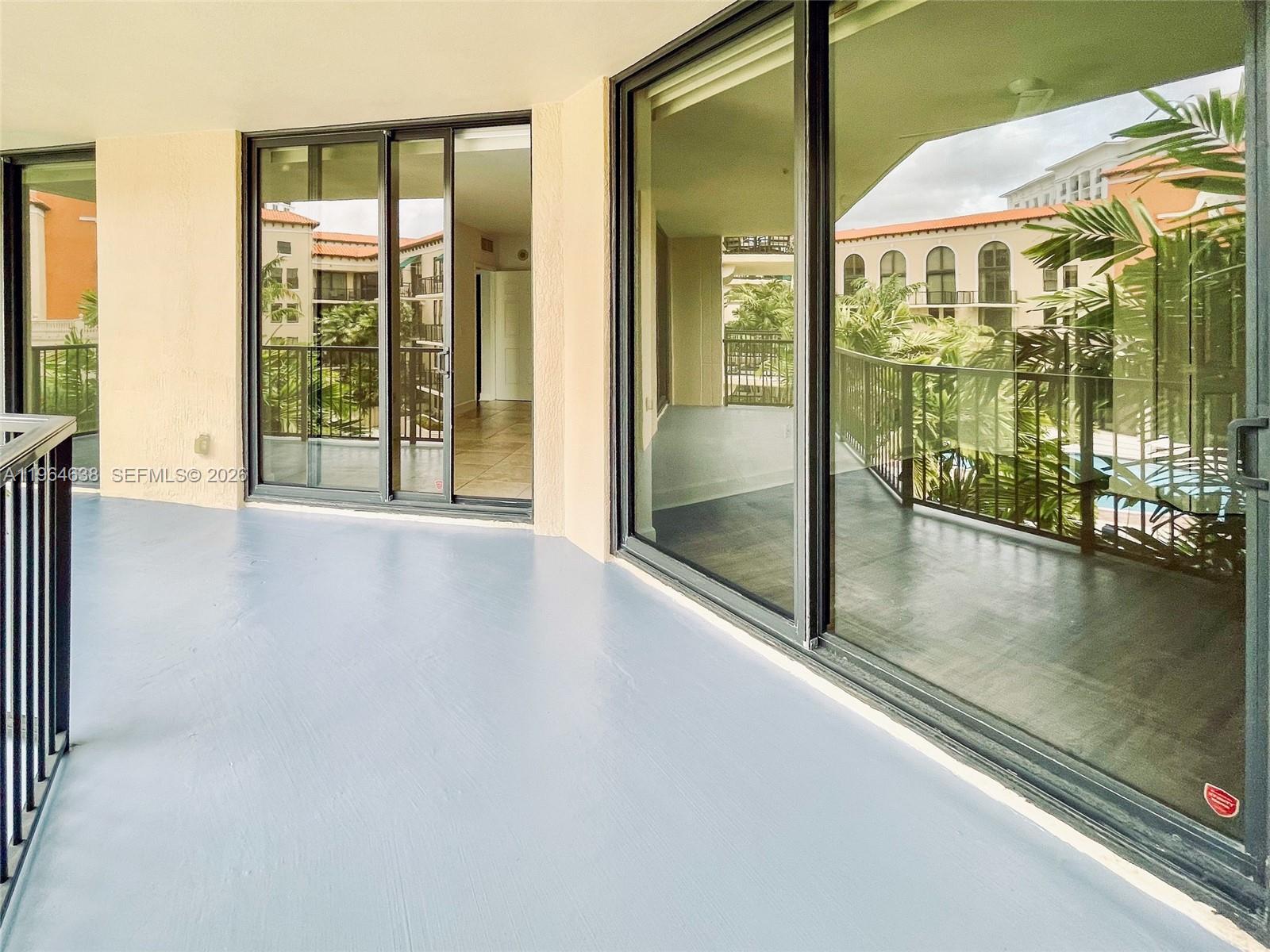 55 Merrick Way, Unit 715 Coral Gables, FL 33134 - Photo 6 of 52 a view of an entryway with a glass door