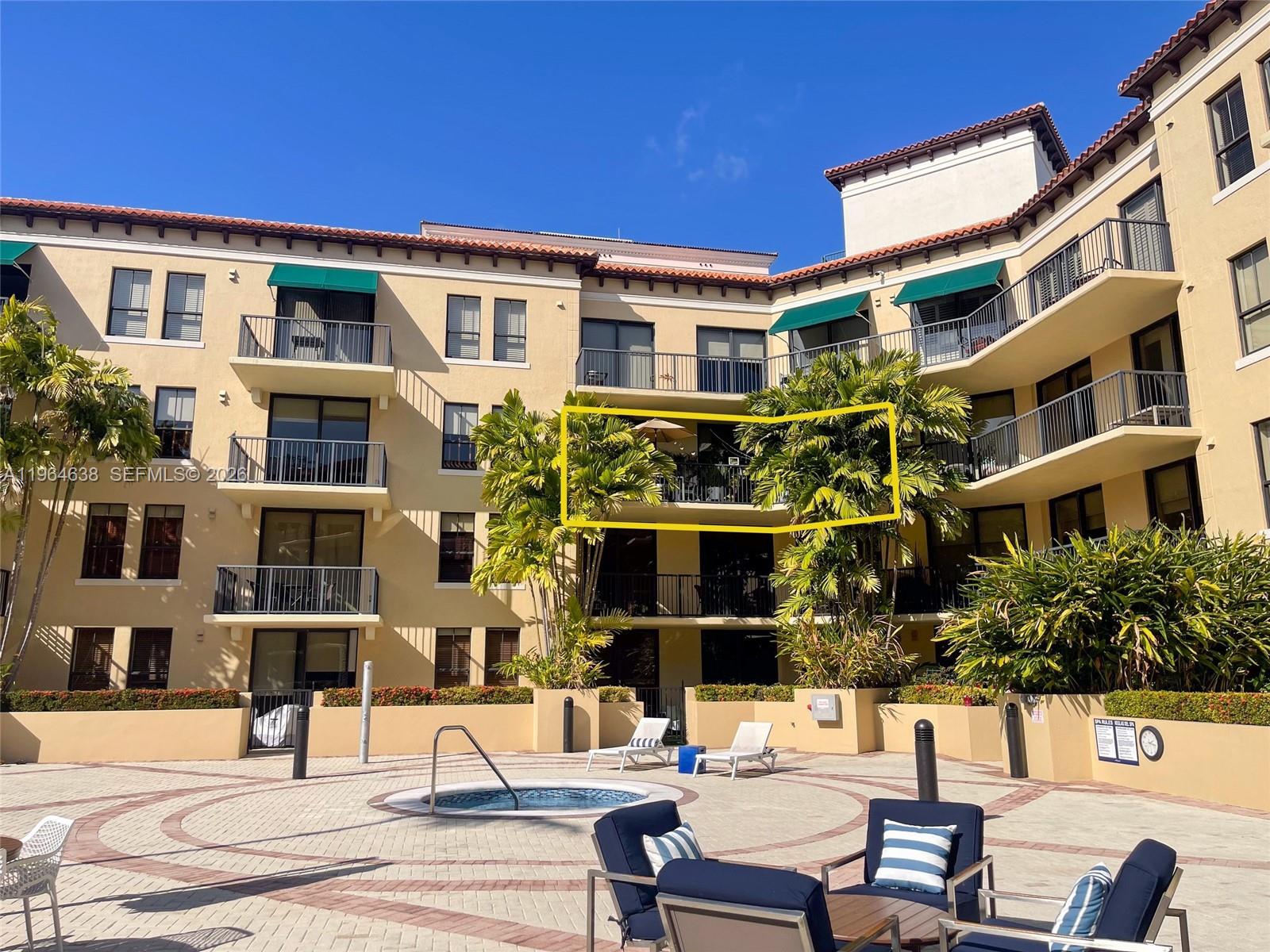 55 Merrick Way, Unit 715 Coral Gables, FL 33134 - Photo 9 of 52 a view of a building with a street