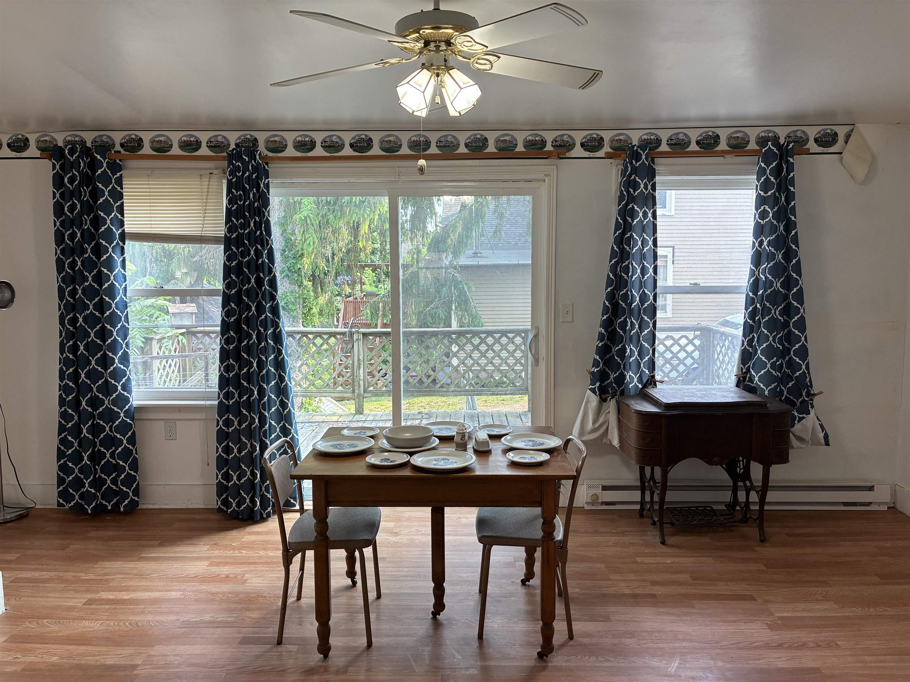115 North Clay Street Mount Carroll, IL 61053 - Photo 11 of 61 a view of a dining room with furniture window and wooden floor