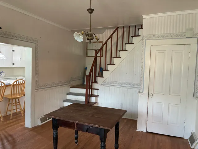 a view of entryway with wooden floor