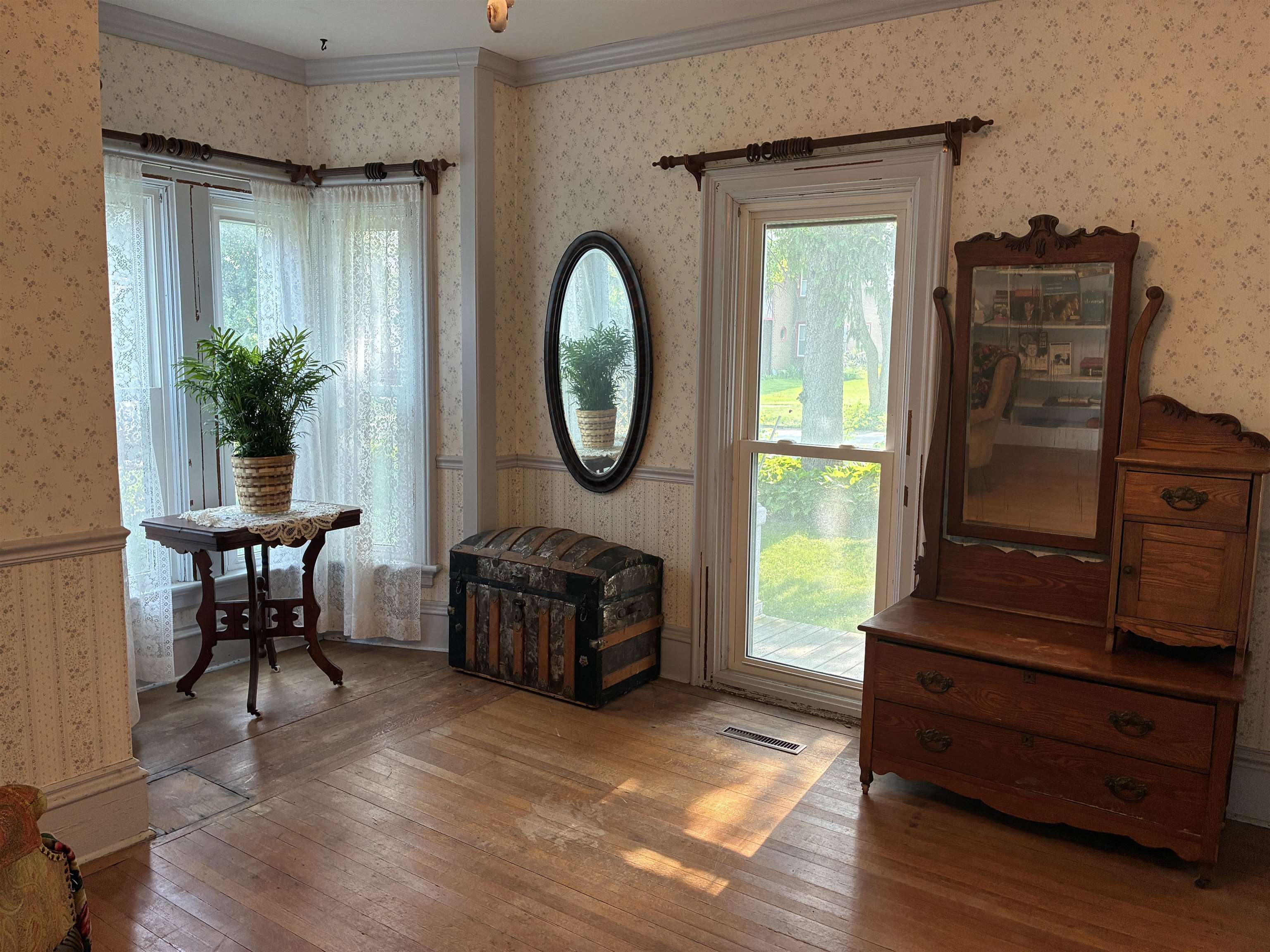 115 North Clay Street Mount Carroll, IL 61053 - Photo 20 of 61 a living room with furniture and a window