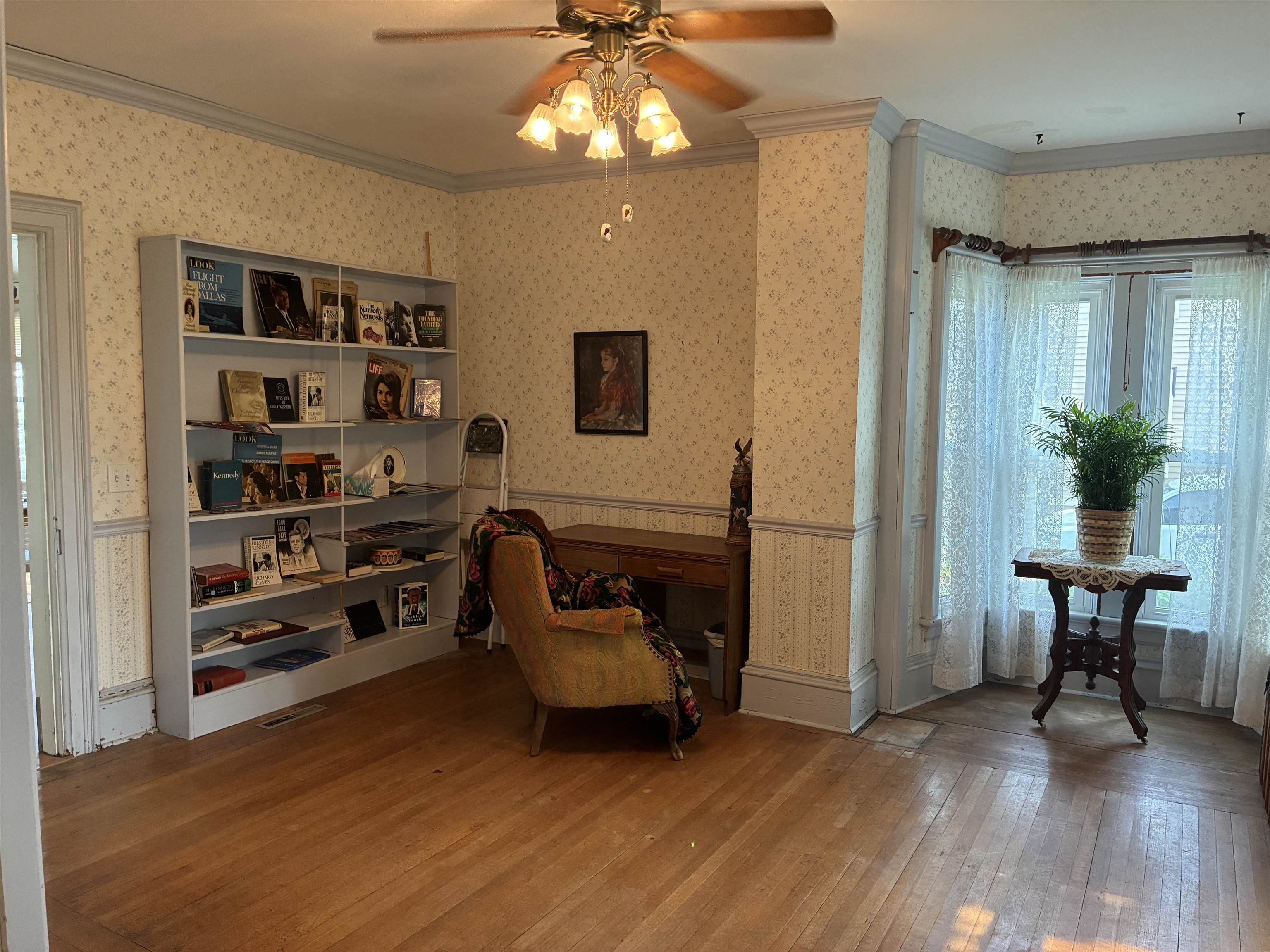 115 North Clay Street Mount Carroll, IL 61053 - Photo 23 of 61 a living room with furniture and a window