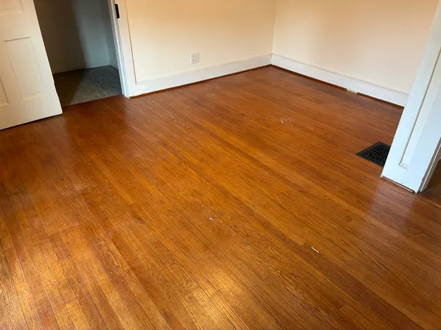 a view of a bathroom with a shower and a sink