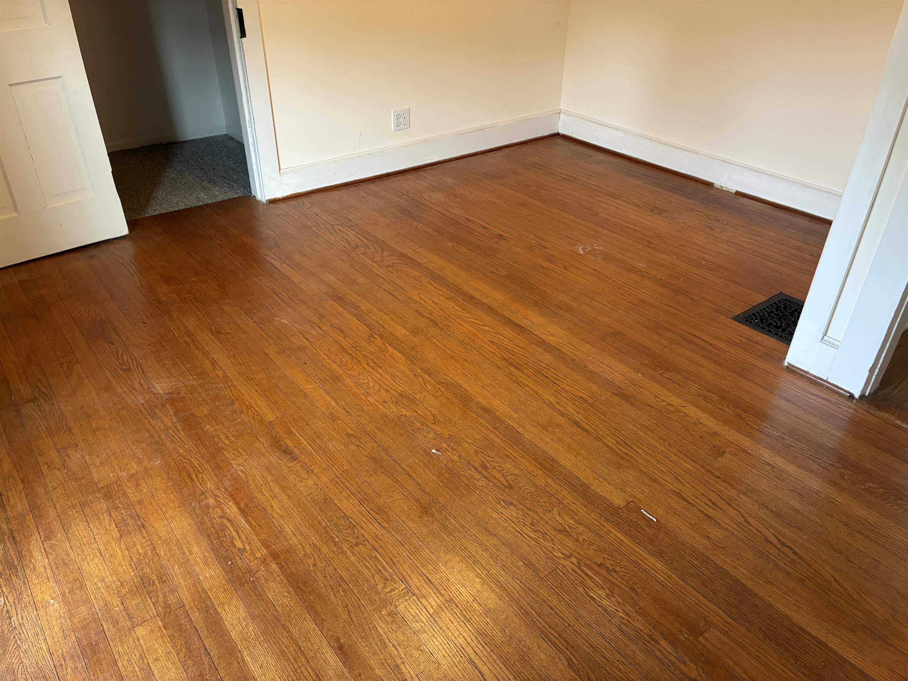 115 North Clay Street Mount Carroll, IL 61053 - Photo 38 of 61 an empty room with wooden floor