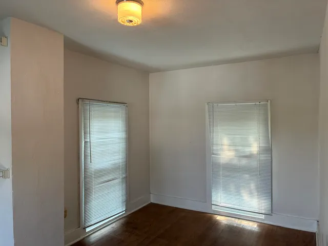 a flower garden is sitting in front of flowers