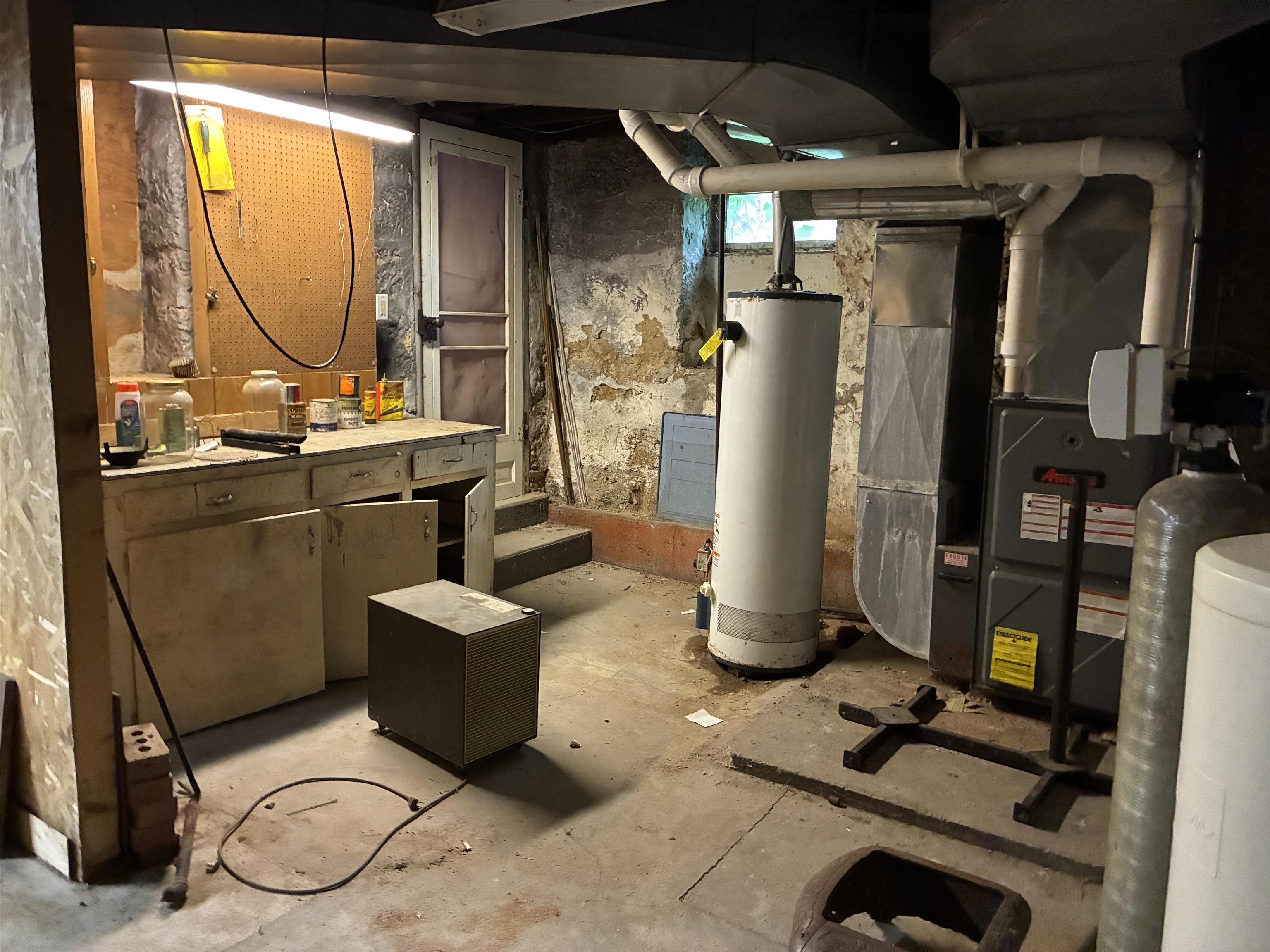 115 North Clay Street Mount Carroll, IL 61053 - Photo 51 of 61 a room with gym equipment and a mirror