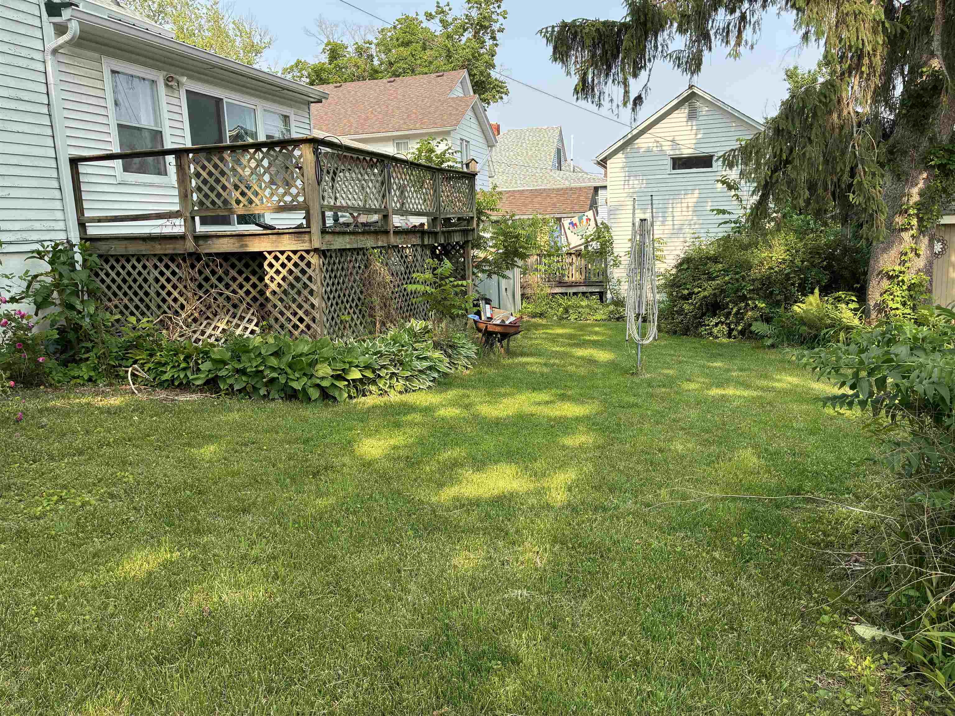 115 North Clay Street Mount Carroll, IL 61053 - Photo 54 of 61 a view of a house with a yard