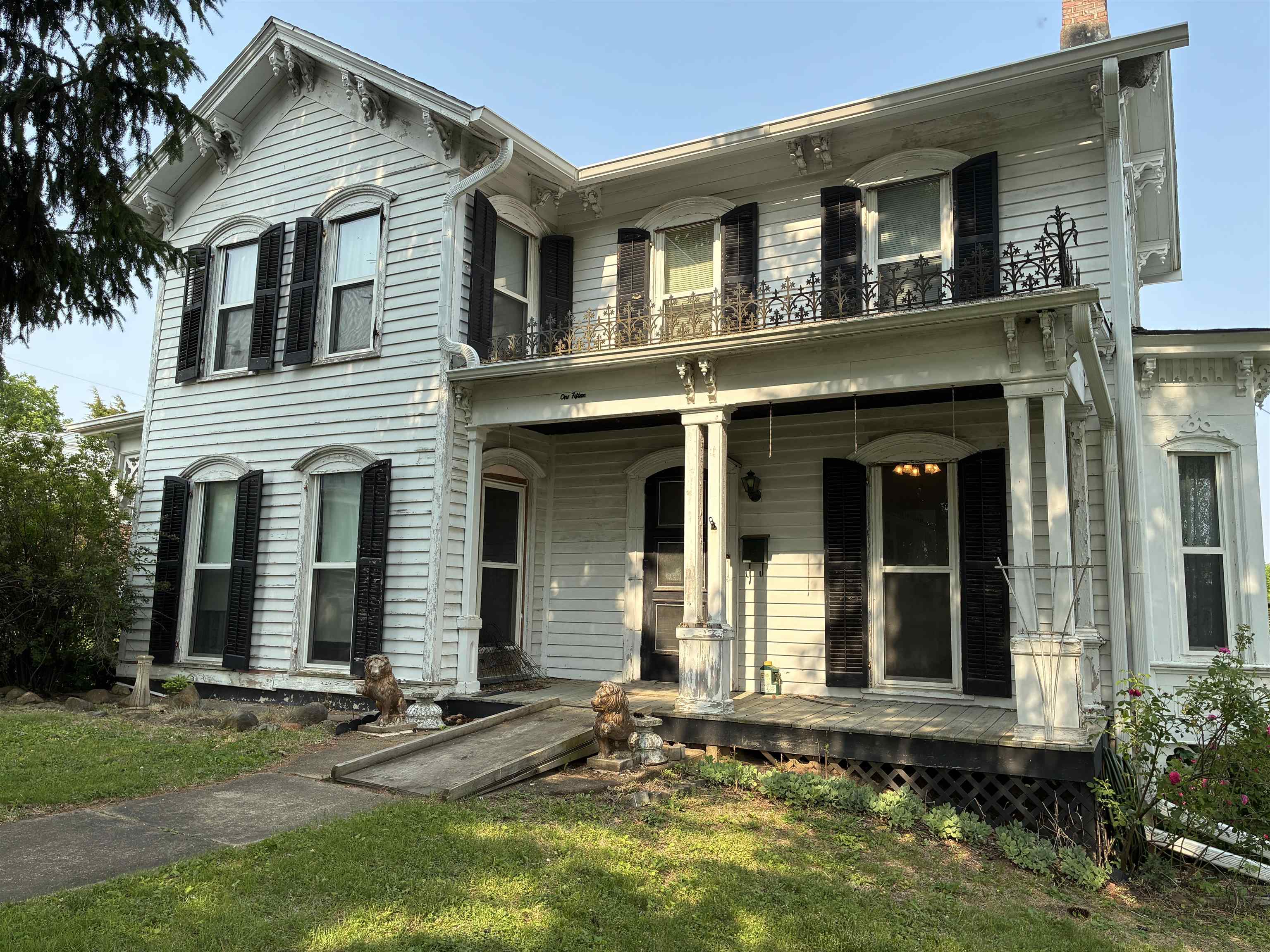 115 North Clay Street Mount Carroll, IL 61053 - Photo 60 of 61 front view of a house with a yard