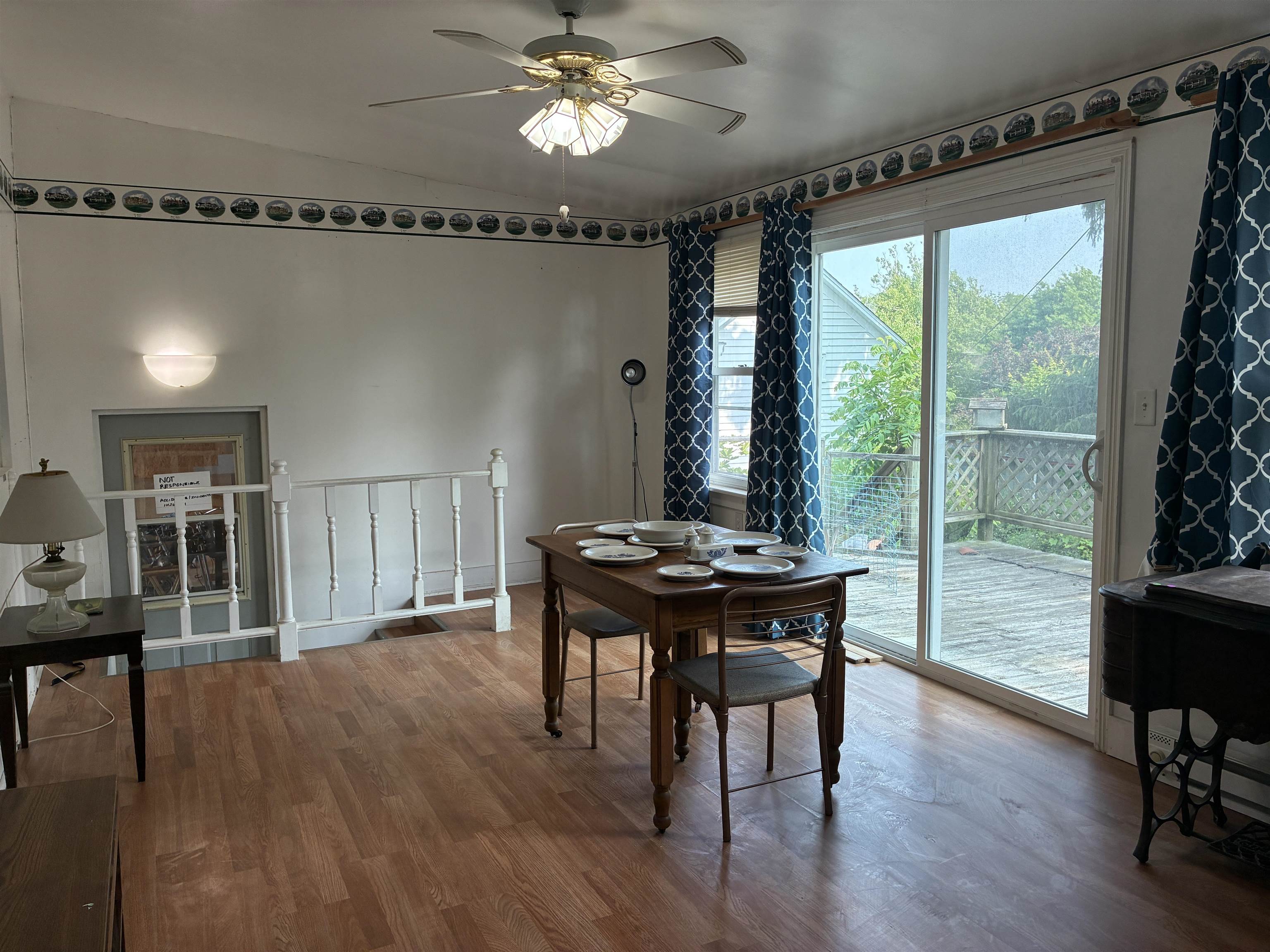 115 North Clay Street Mount Carroll, IL 61053 - Photo 10 of 61 a view of a dining room with furniture window and wooden floor
