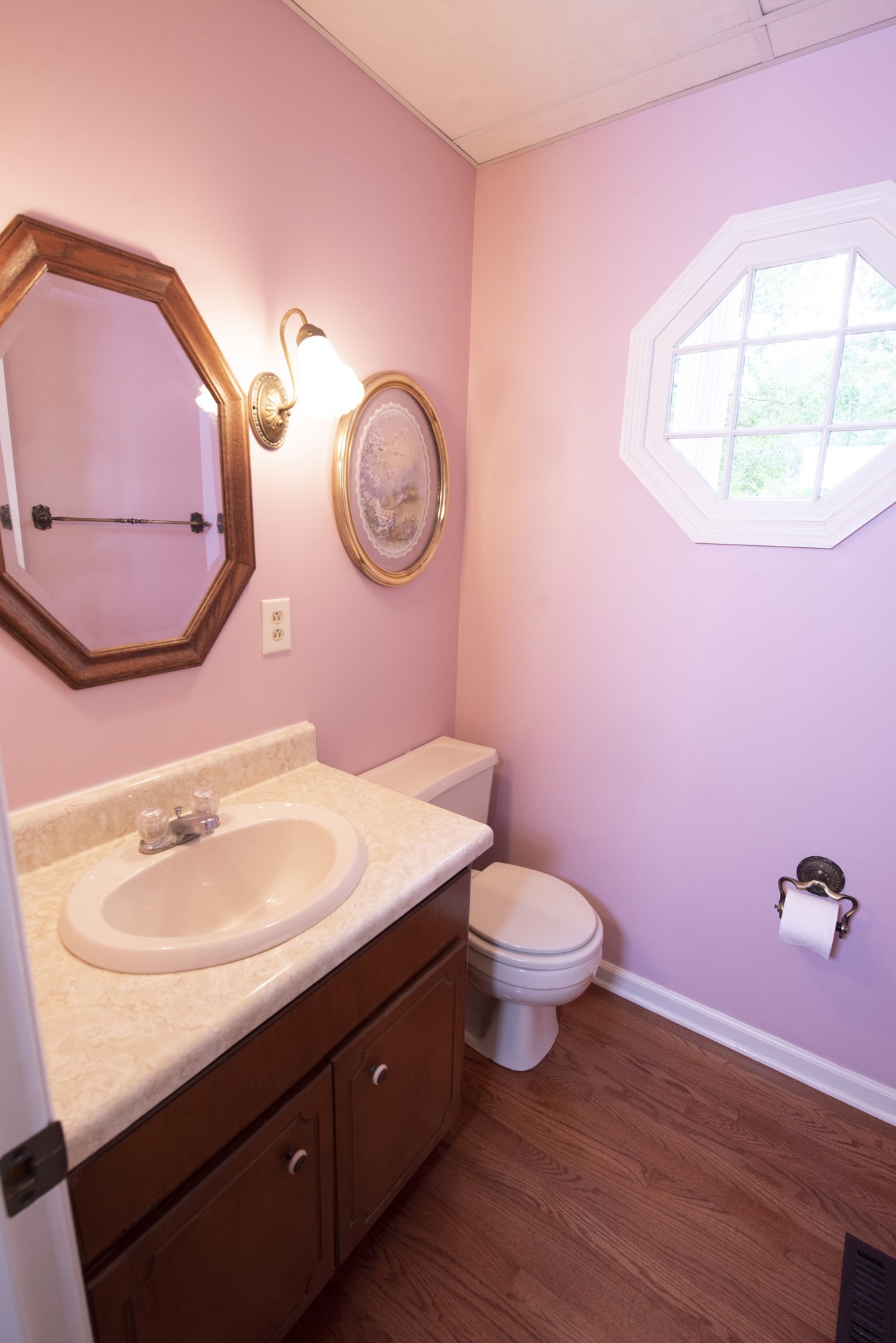 836 Dripping Springs Road Winchester, TN 37398 - Photo 12 of 37 a bathroom with a sink mirror and toilet