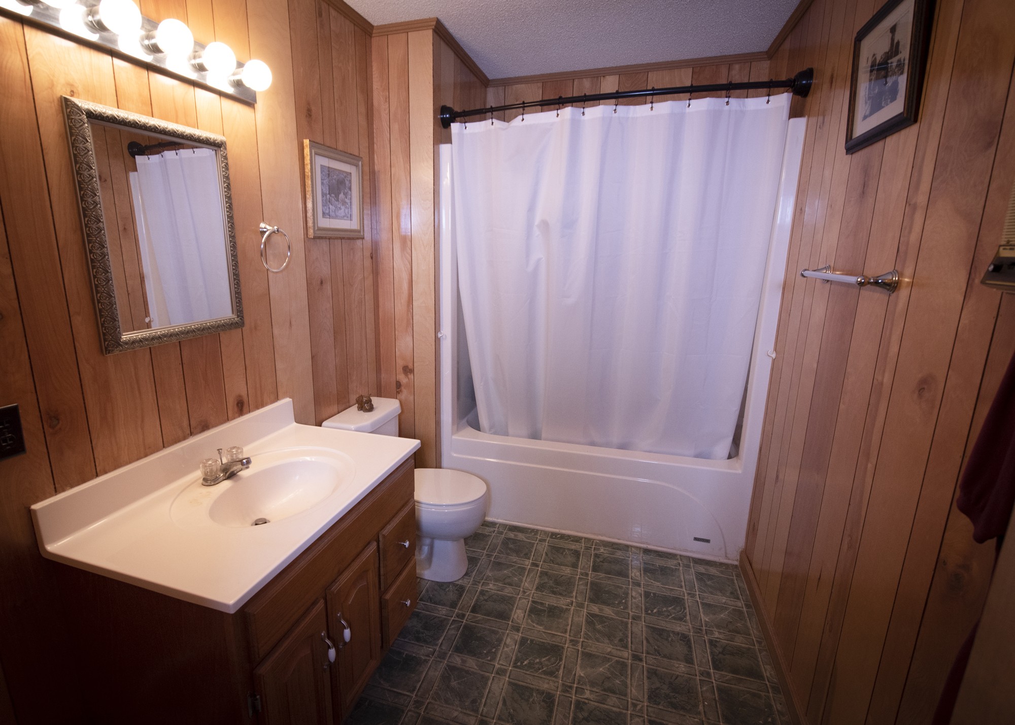 836 Dripping Springs Road Winchester, TN 37398 - Photo 15 of 37 a bathroom with a sink toilet and shower