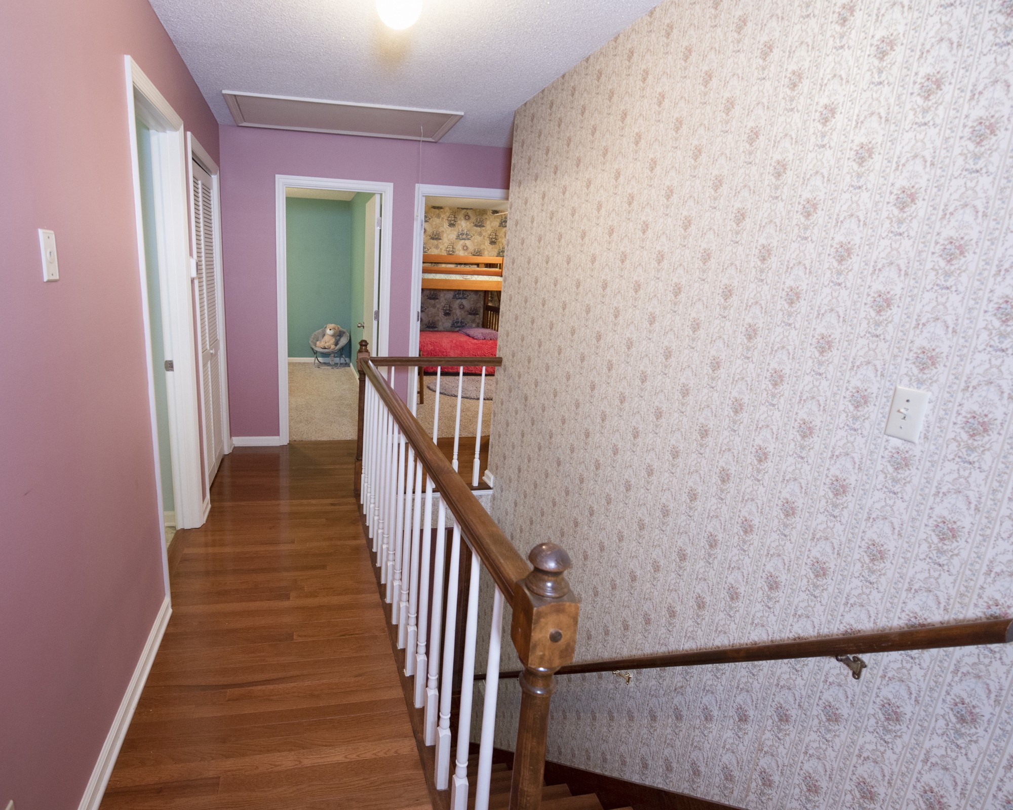 836 Dripping Springs Road Winchester, TN 37398 - Photo 19 of 37 a view of a hallway with wooden floor and staircase