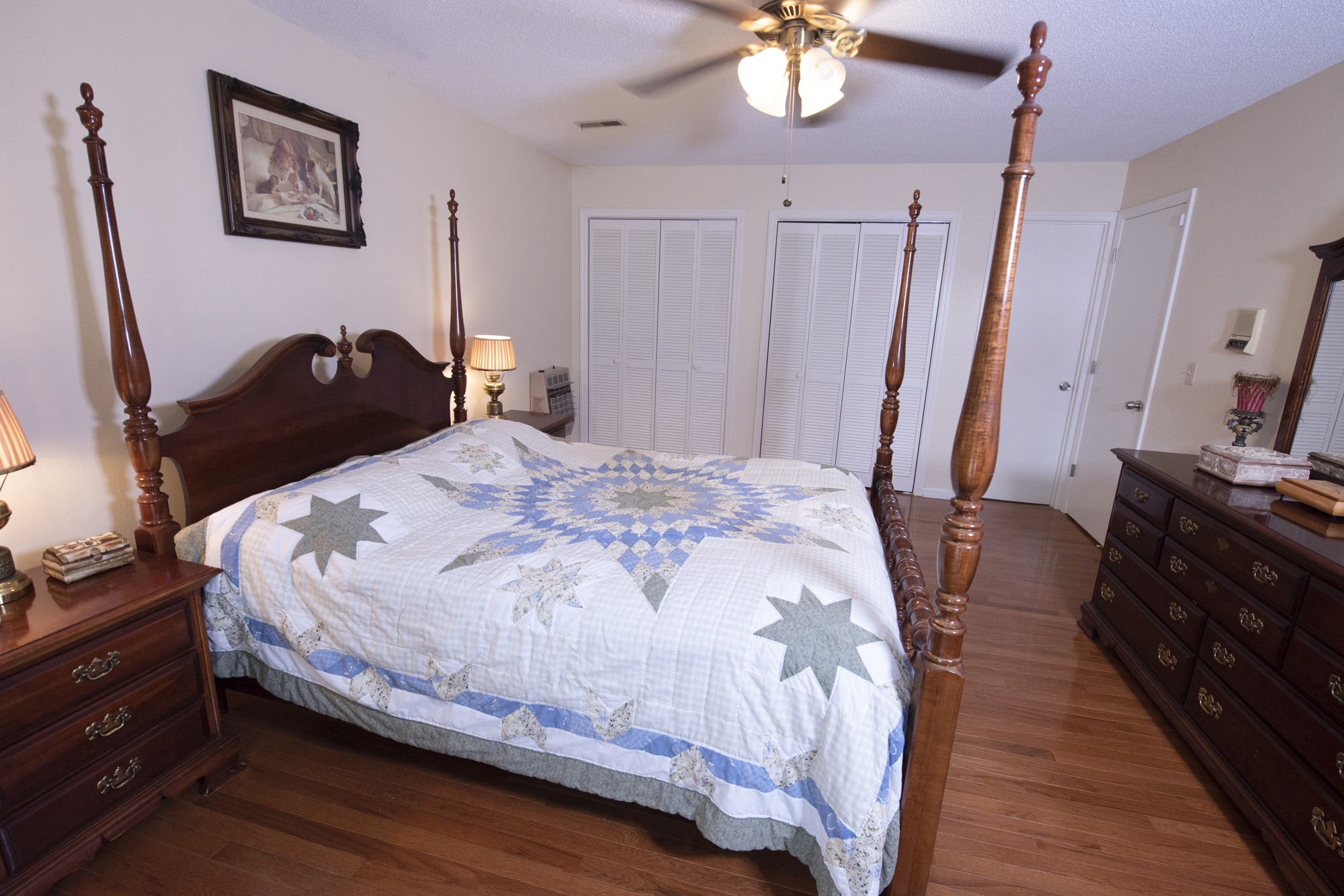 836 Dripping Springs Road Winchester, TN 37398 - Photo 20 of 37 a bedroom with a bed and a mirror on the dresser