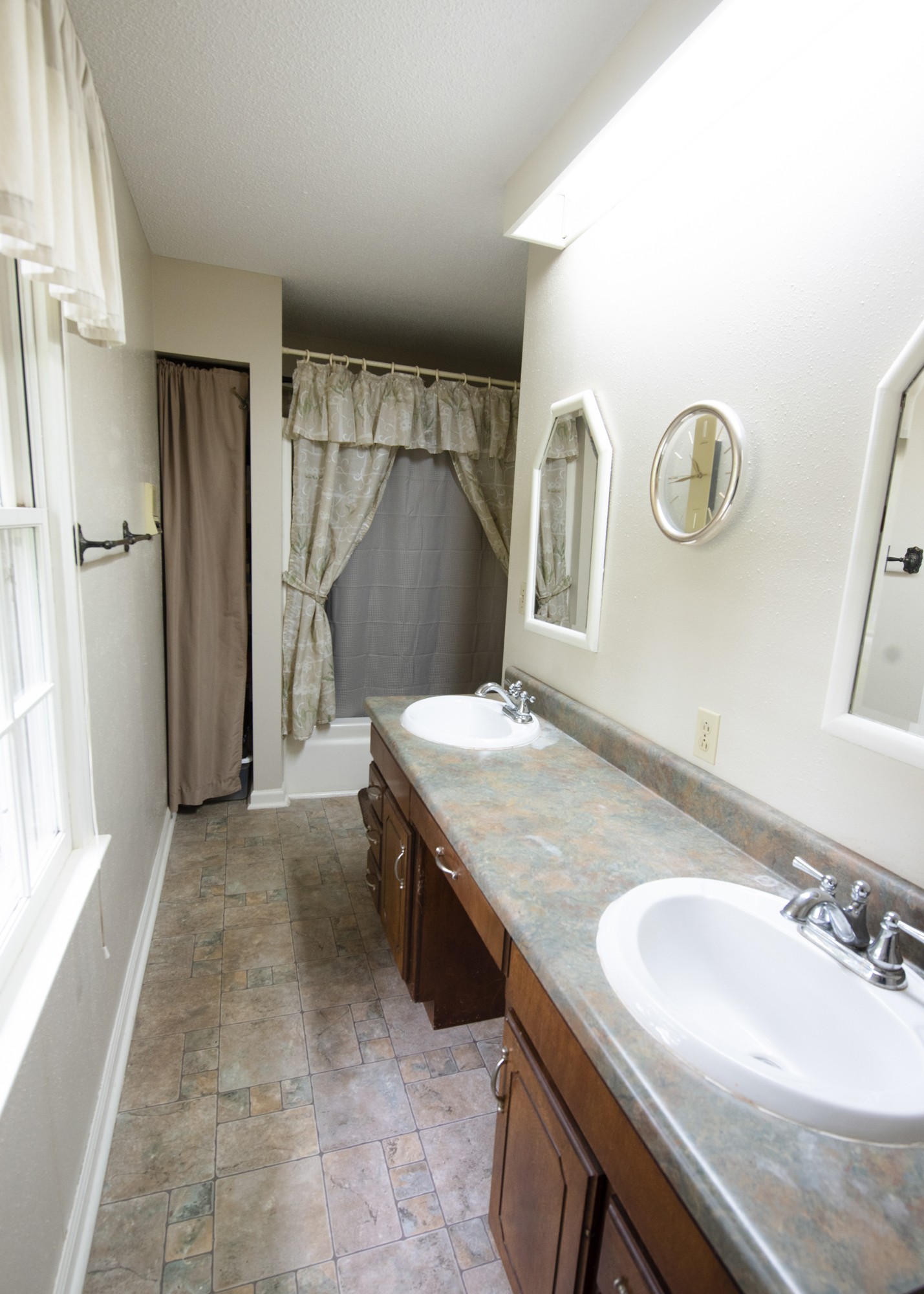 836 Dripping Springs Road Winchester, TN 37398 - Photo 23 of 37 a bathroom with a granite countertop sink a mirror and shower