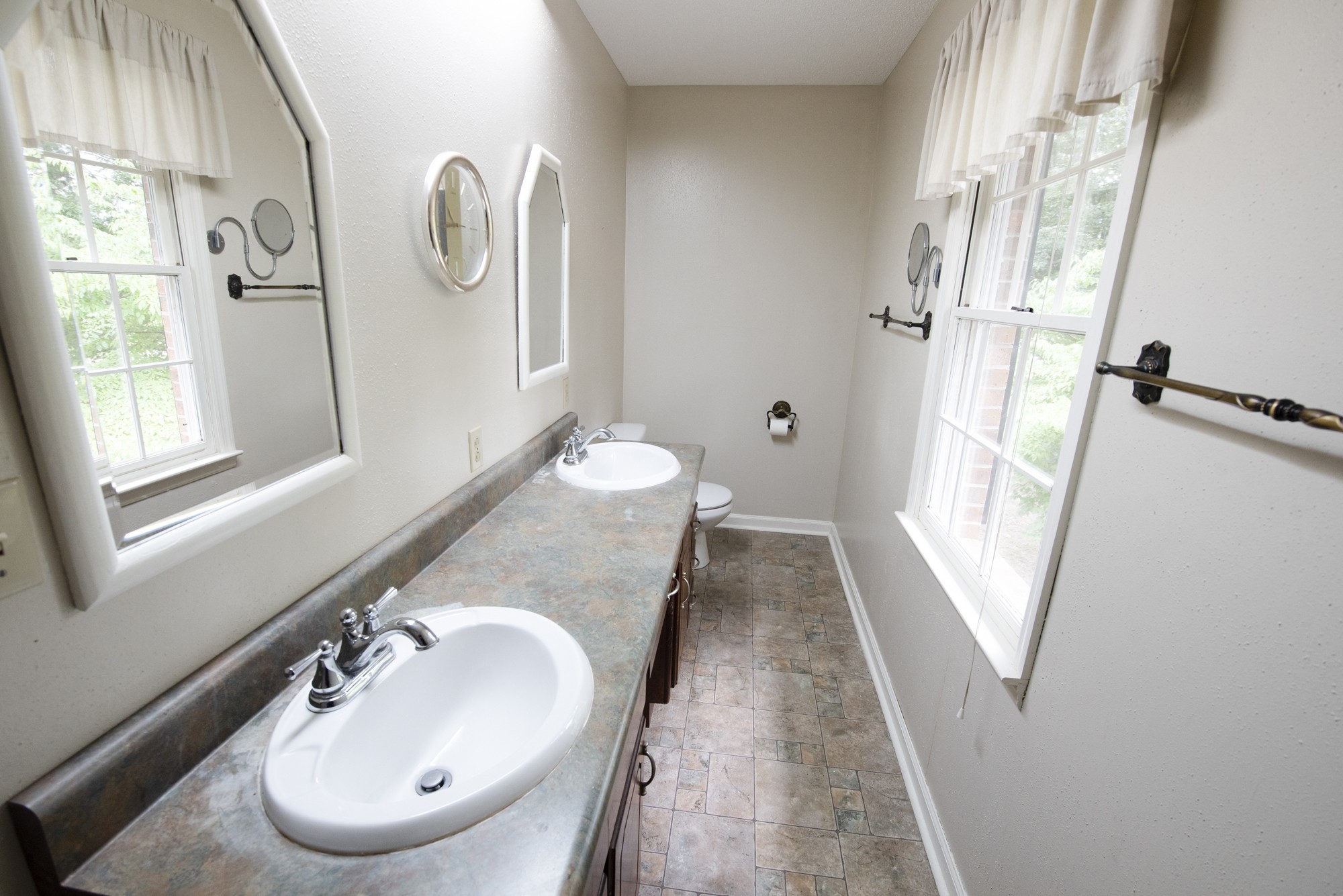 836 Dripping Springs Road Winchester, TN 37398 - Photo 24 of 37 a bathroom with a sink and mirror with bathtub