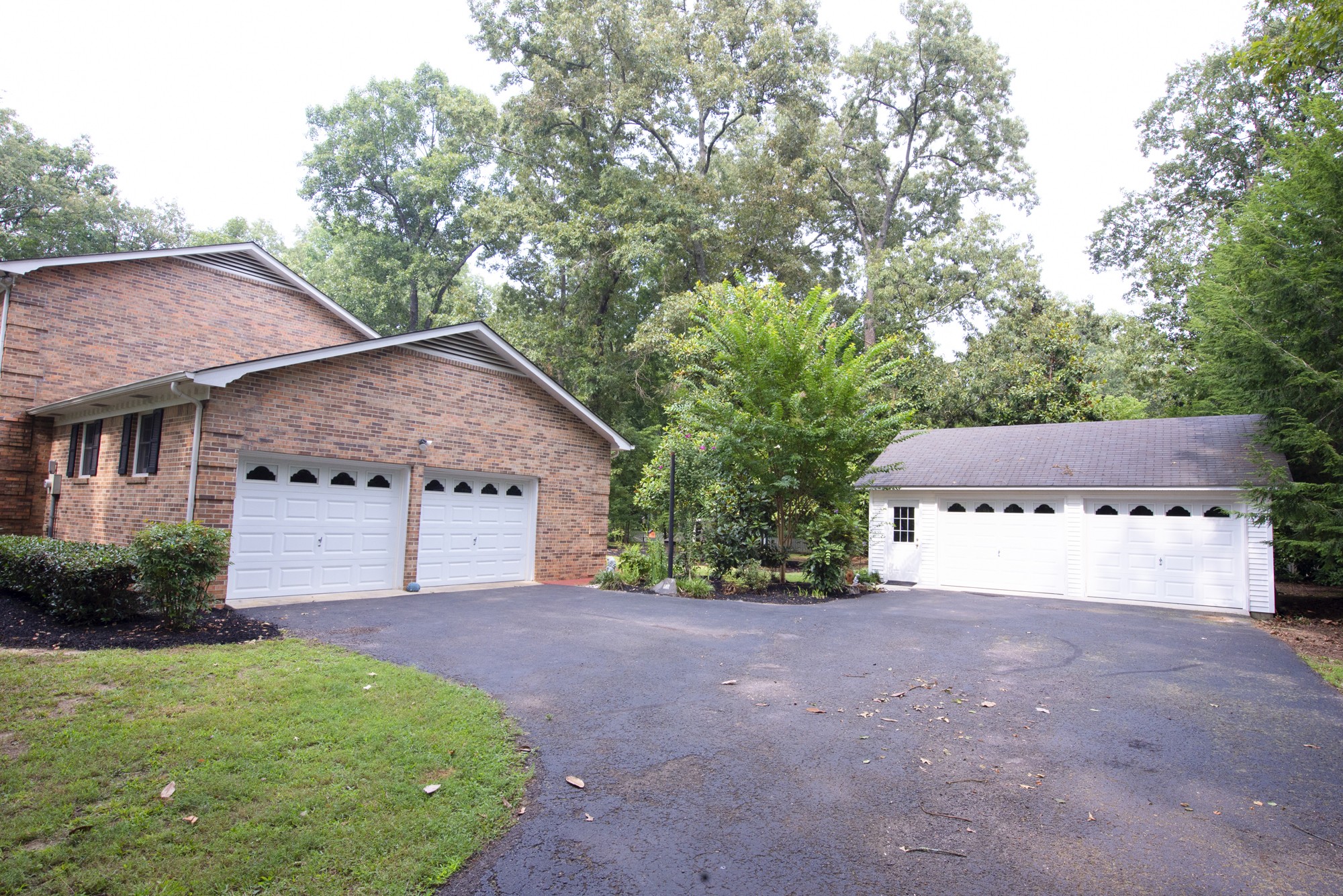 836 Dripping Springs Road Winchester, TN 37398 - Photo 29 of 37 a view of backyard with large tree and wooden fence