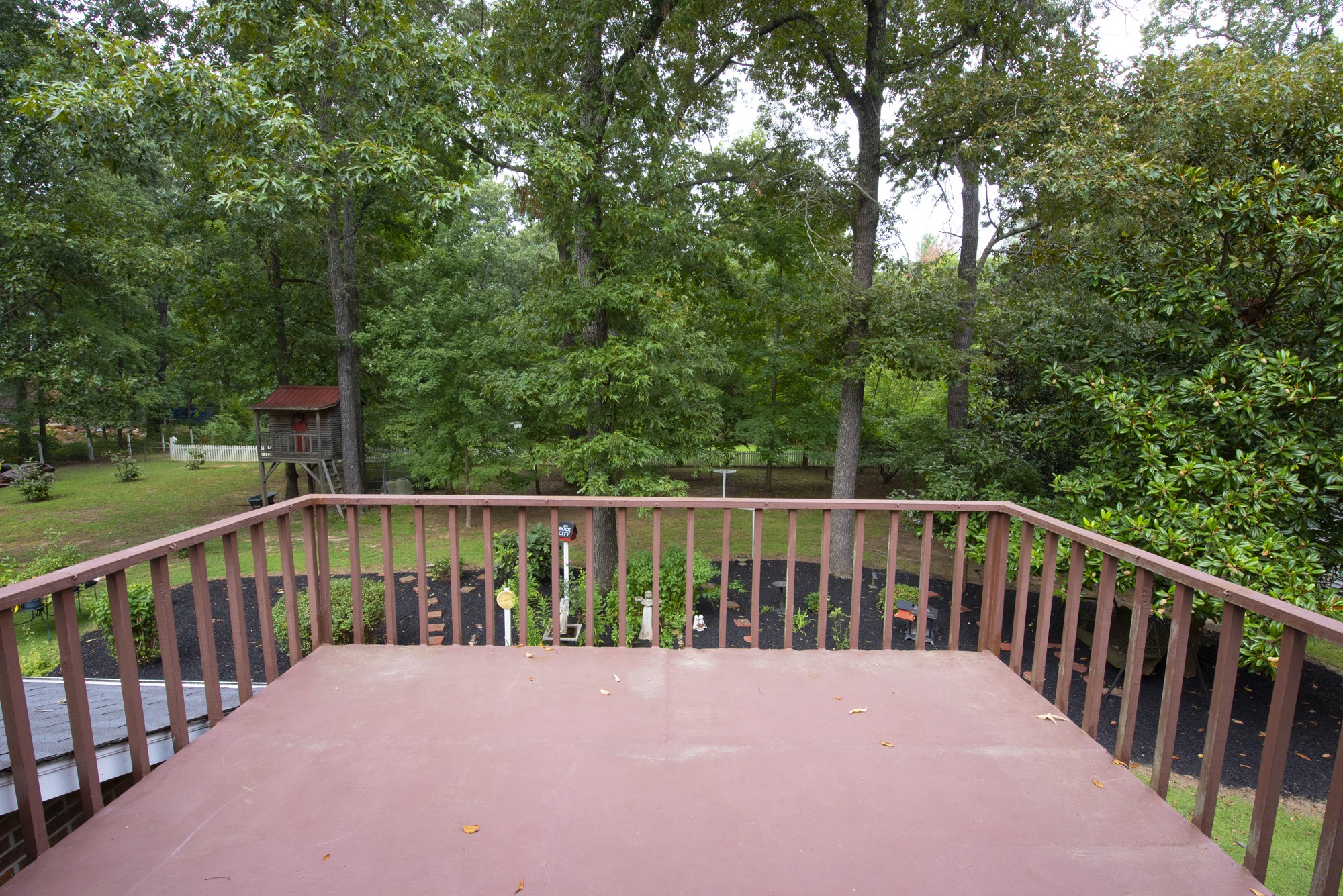 836 Dripping Springs Road Winchester, TN 37398 - Photo 30 of 37 a balcony with wooden floor and fence