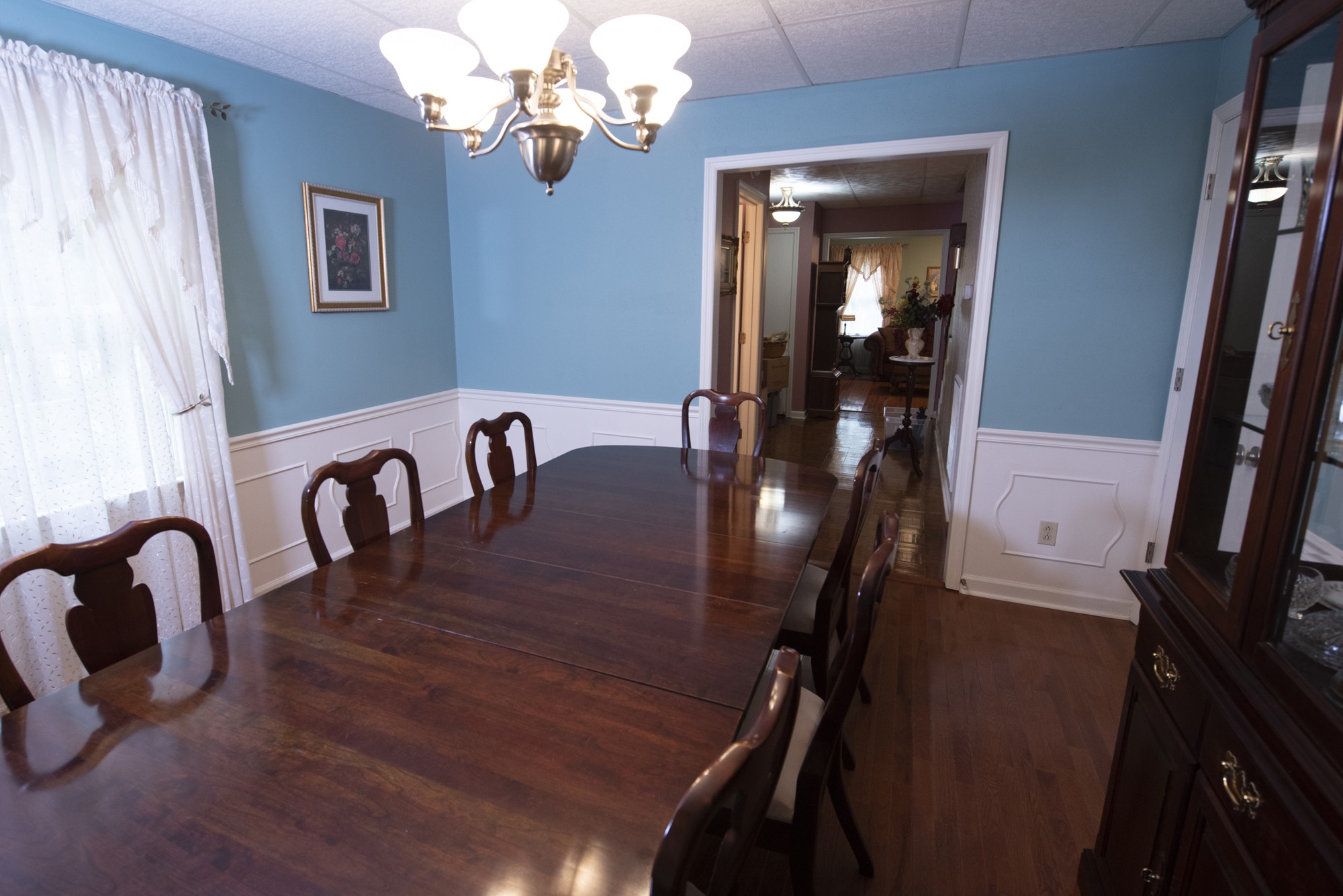 836 Dripping Springs Road Winchester, TN 37398 - Photo 8 of 37 a view of a dining room with furniture and chandelier