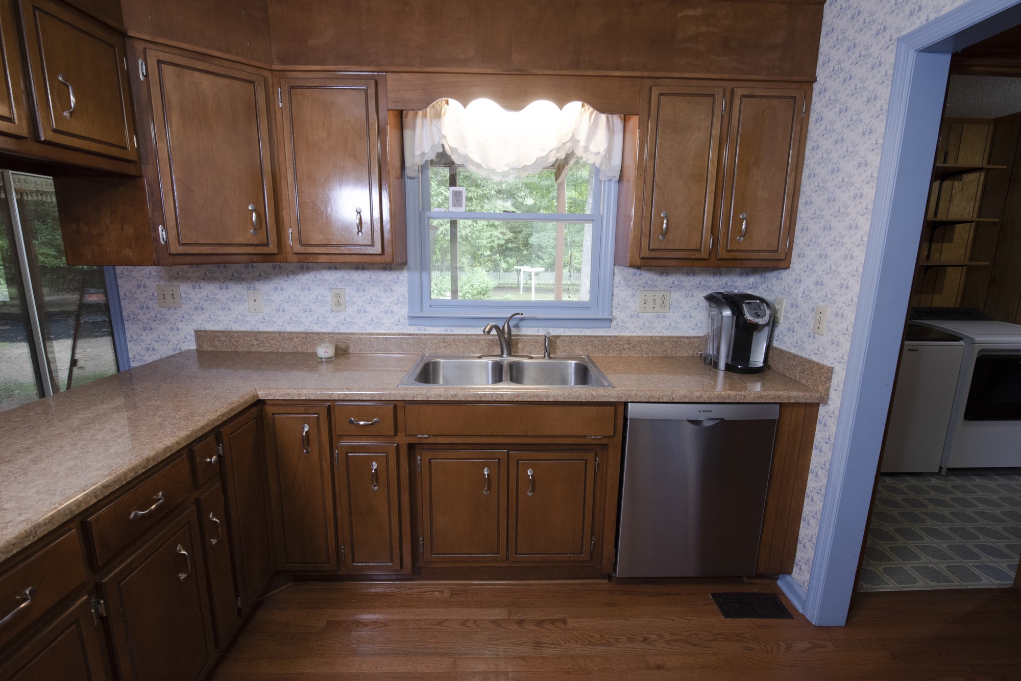 836 Dripping Springs Road Winchester, TN 37398 - Photo 10 of 37 a kitchen with sink cabinets and window