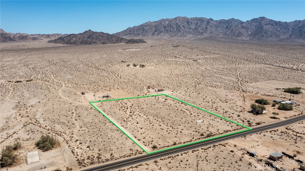 a view of a mountain from a backyard