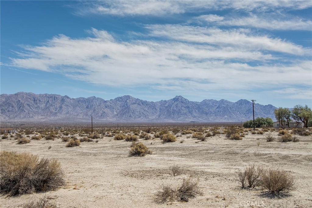 87000 Amboy Road Twentynine Palms, CA 92277 - Photo 16 of 17 a view of an ocean beach and a mountain