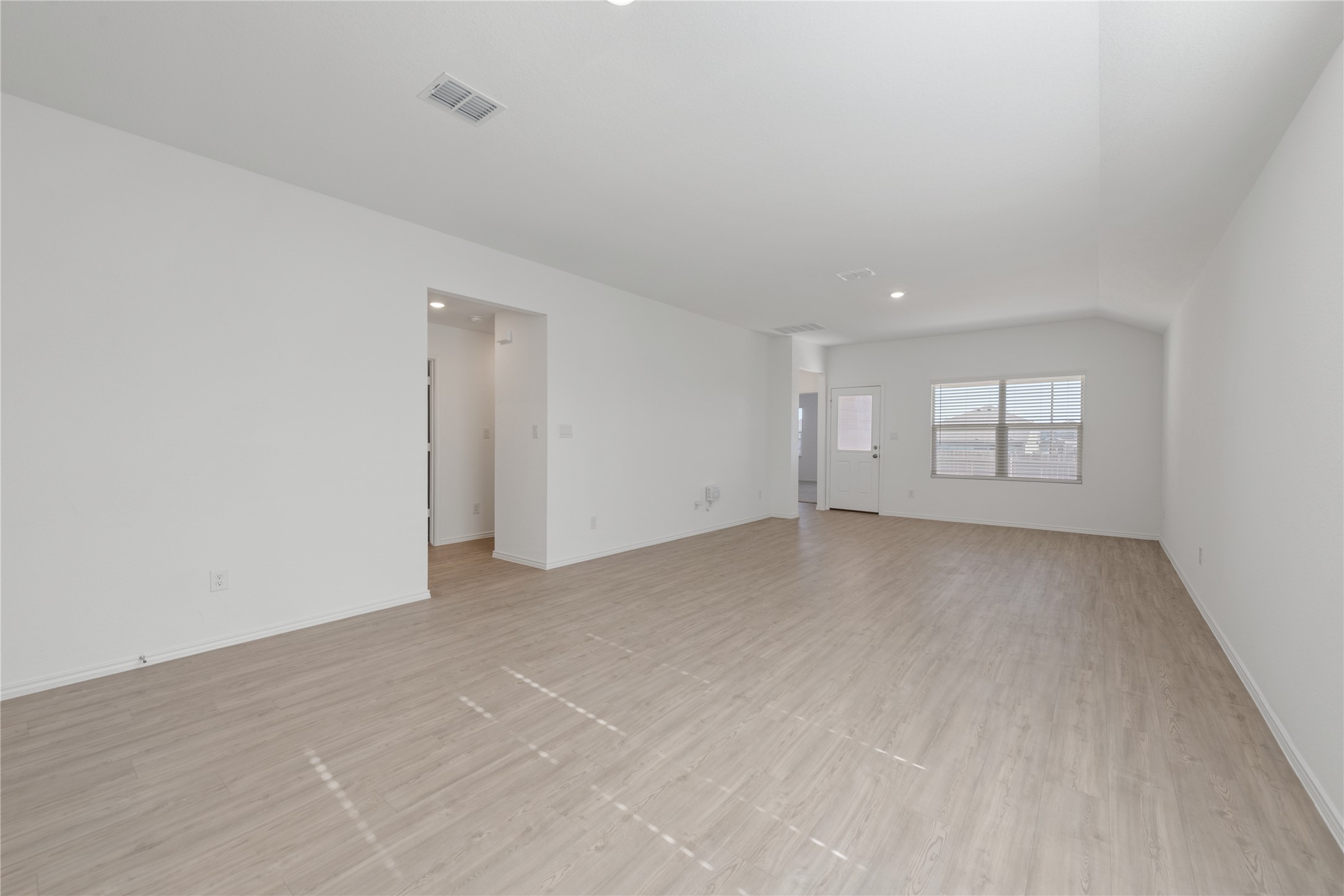153 Sormonne Loop Kyle, TX 78640 - Photo 4 of 17 a view of an empty room with a window