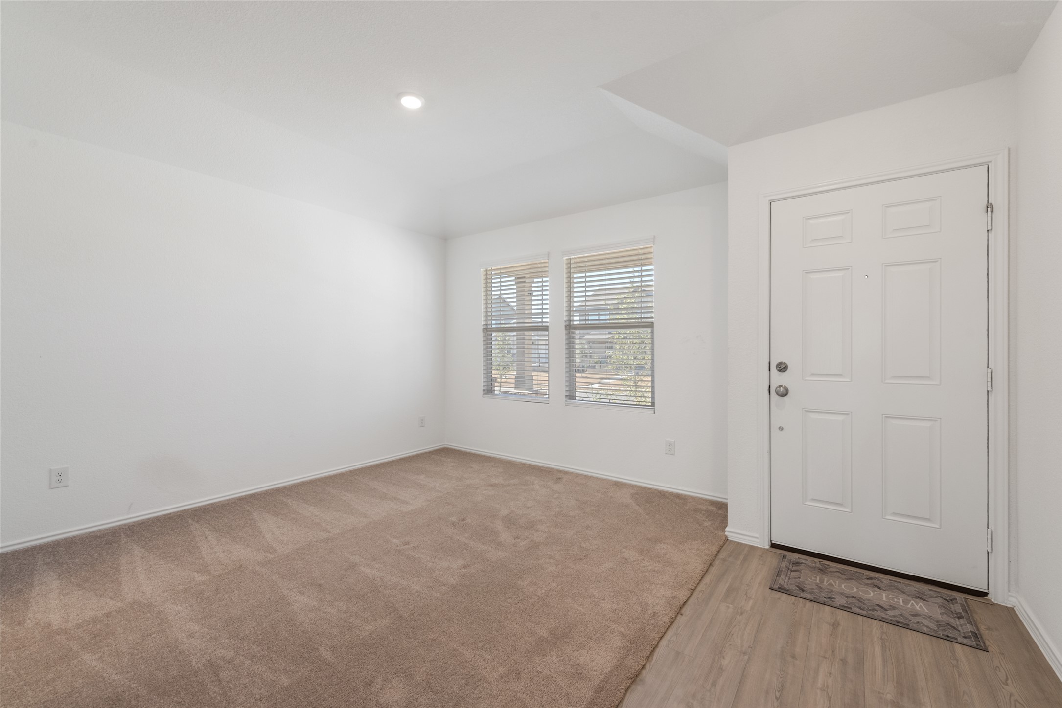 153 Sormonne Loop Kyle, TX 78640 - Photo 5 of 17 an empty room with windows