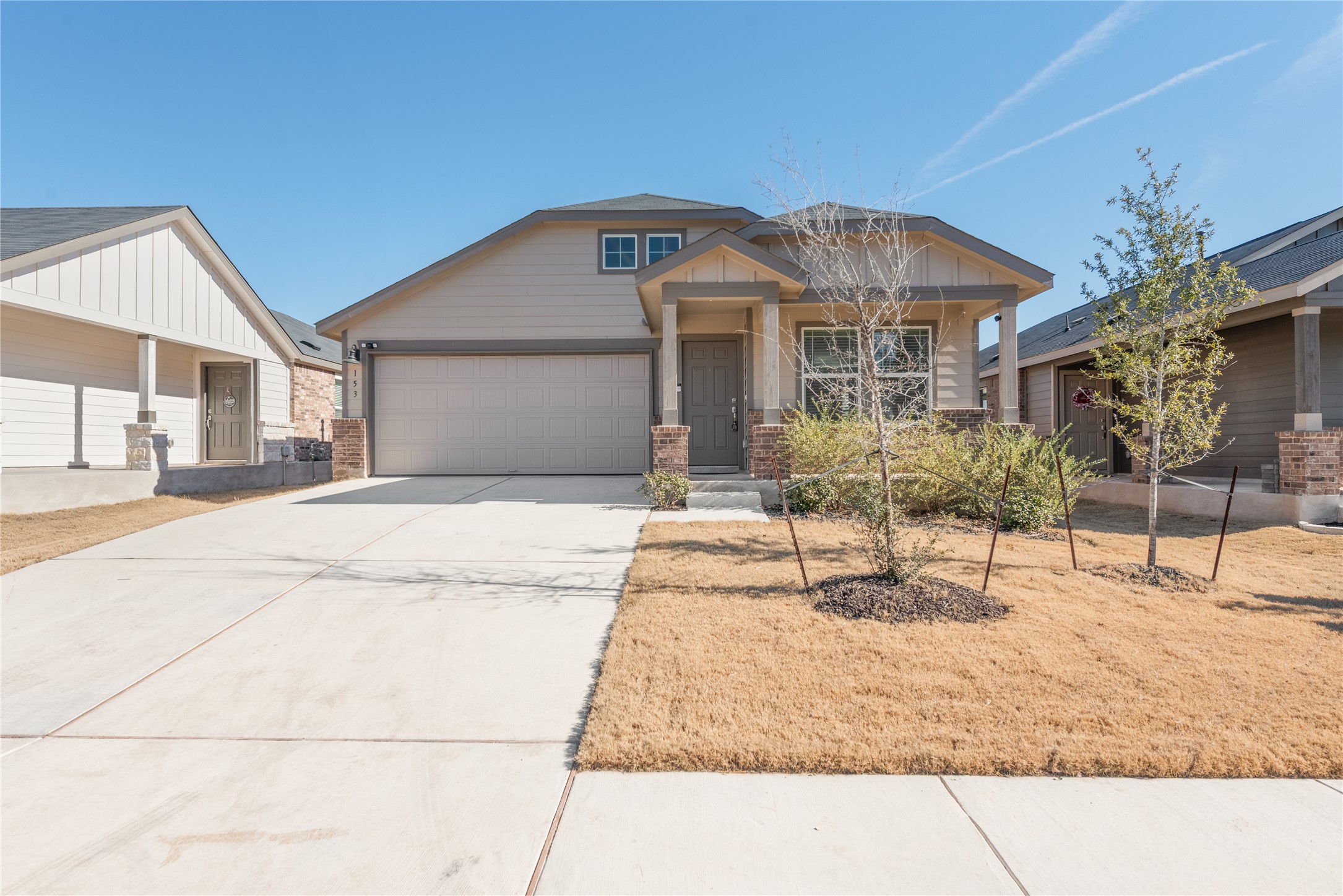 153 Sormonne Loop Kyle, TX 78640 - Photo 6 of 17 a house view with a outdoor space