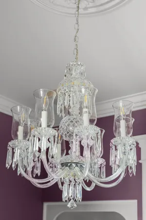 a view of staircase with railing and a rug