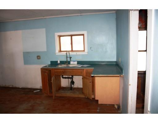 283 Number 9 Road Heath, MA 01367 - Photo 3 of 16 a room with a table and a potted plant