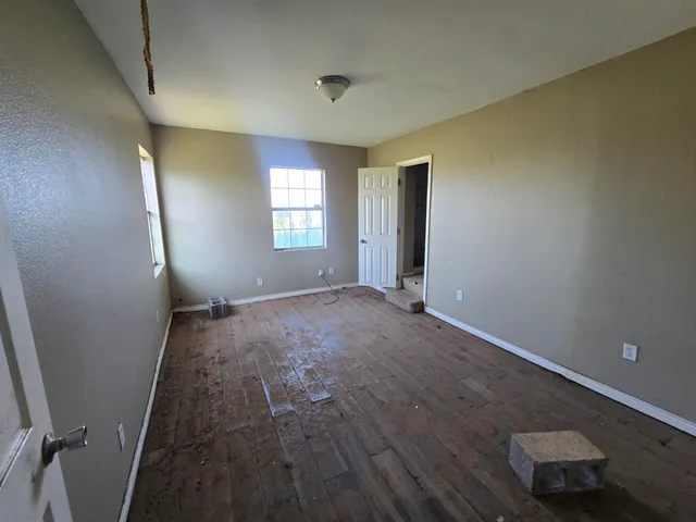 an empty room with windows