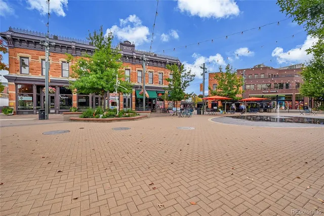a city street lined with tall buildings