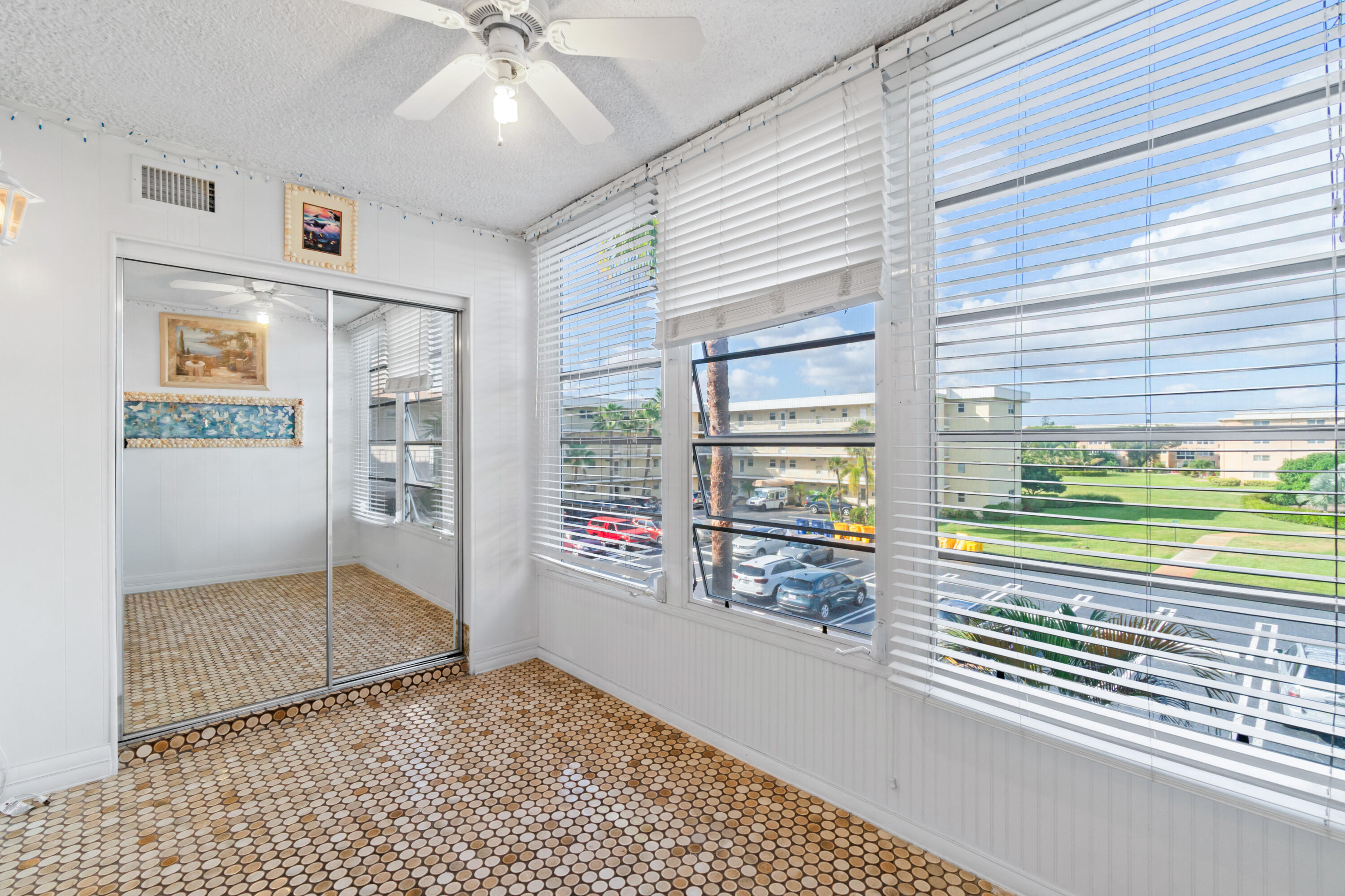 2615 Northeast 1st Court, Unit 303 Boynton Beach, FL 33435 - Photo 23 of 44 en empty room with window