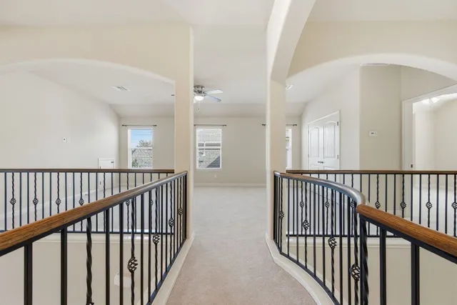 workspace with wooden floor and windows