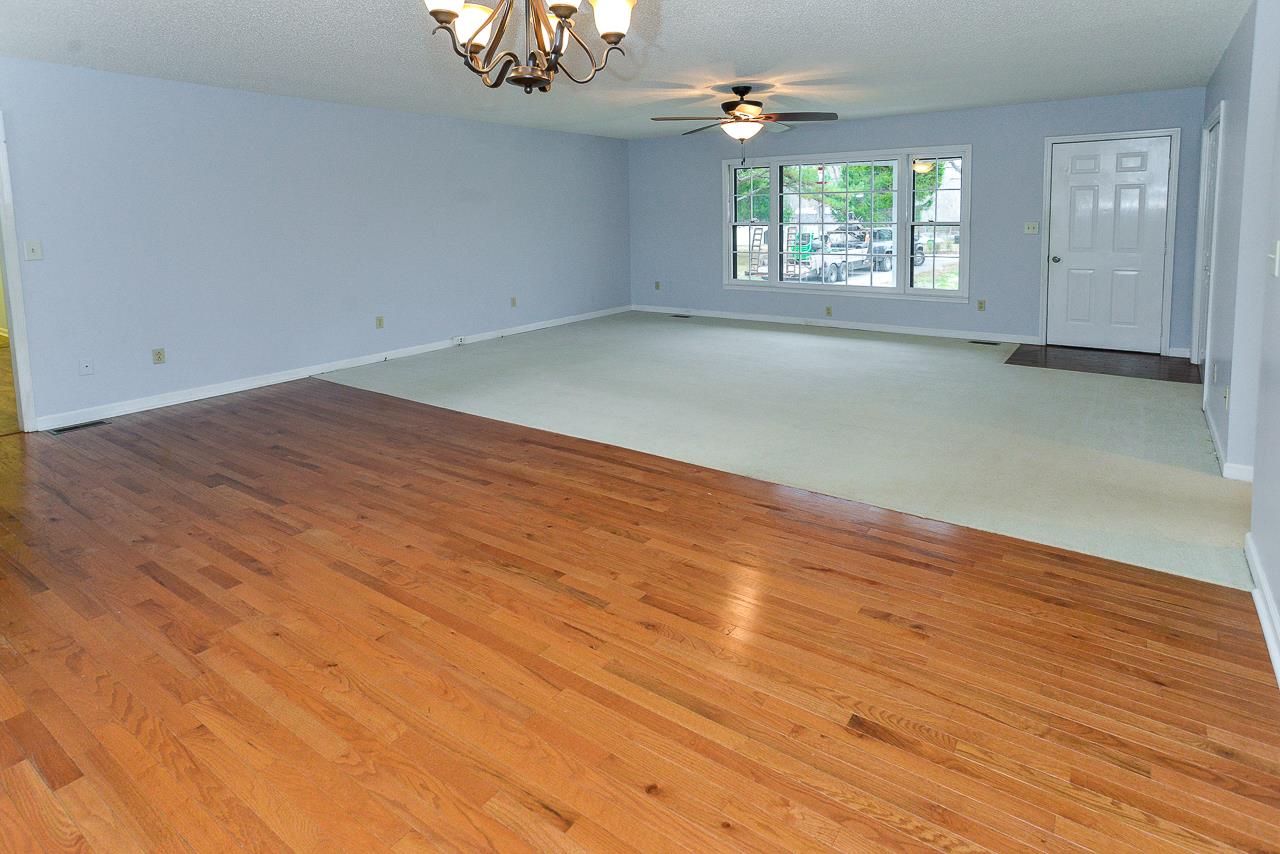 3018 Bobo Section Road Hazel Green, AL 35750 - Photo 4 of 30 The dining room opens to the living room.