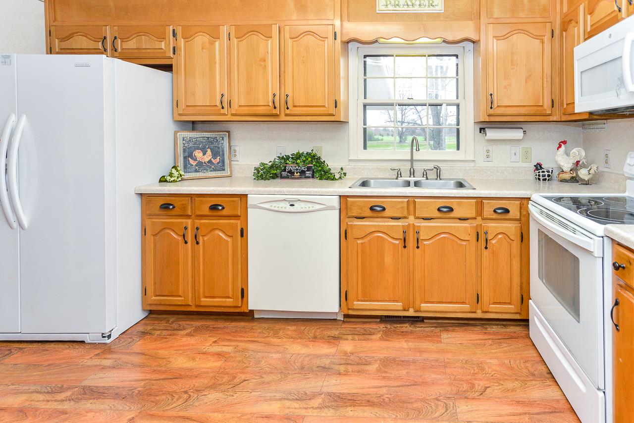 3018 Bobo Section Road Hazel Green, AL 35750 - Photo 7 of 30 The kitchen has hardwood floors.