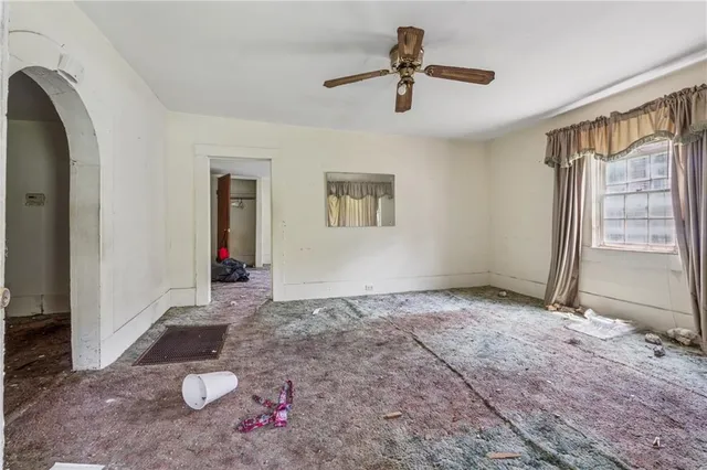 a view of an empty room and window