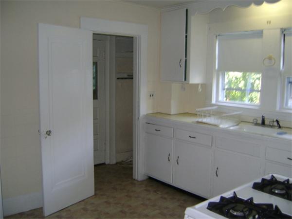 23-25 Channing Road Watertown, MA 02472 - Photo 7 of 12 a view of cabinets and window