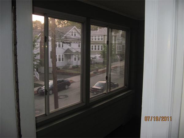 23-25 Channing Road Watertown, MA 02472 - Photo 9 of 12 a view of a glass door