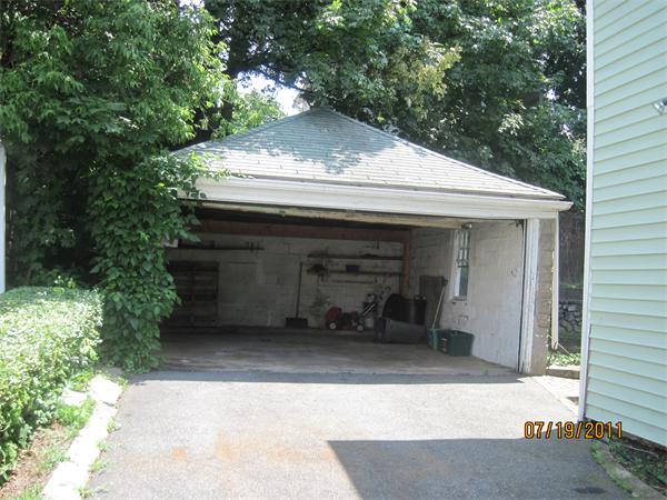 23-25 Channing Road Watertown, MA 02472 - Photo 10 of 12 a front view of a house with yard