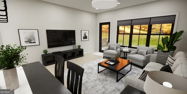 a living room with furniture a flat screen tv and a large window